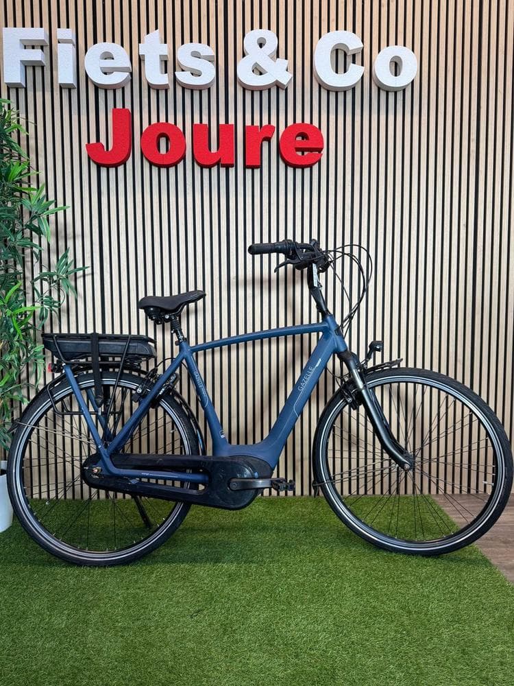 Gazelle Orange C7+ met lage instap en stevige bagagedrager voor een kinderzitje